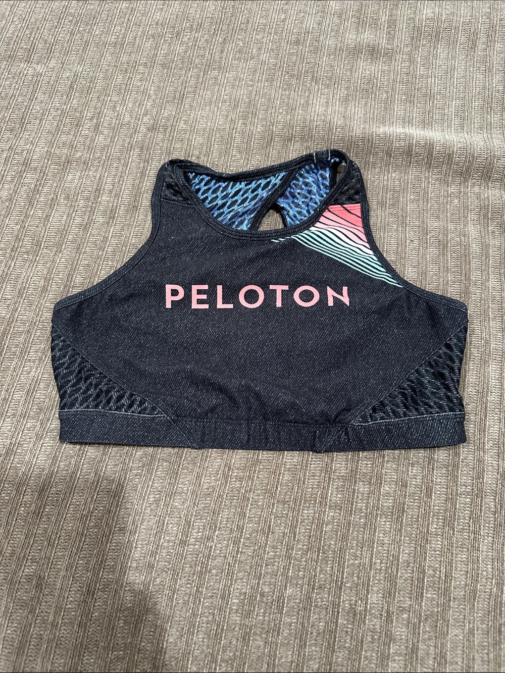 Peloton Black Sports Bra with Pink Logo and Blue-Pink Accent